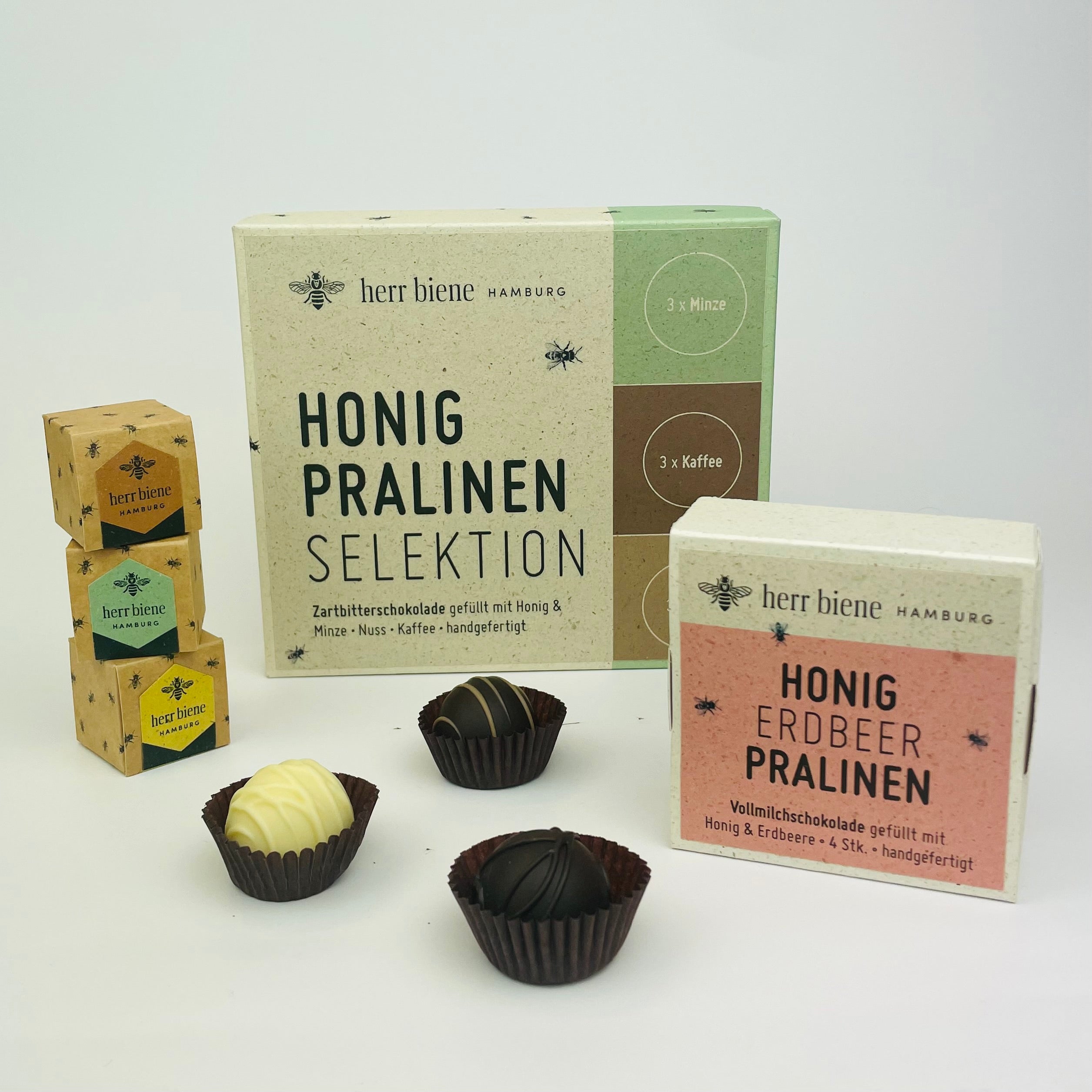 Honigpralinen in allen Verpackungsgrößen zu sehen. Von 1er , 4er bis 9er Schachteln