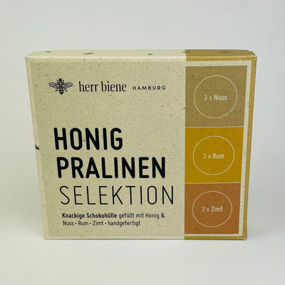Neun Honigpralinen als Selektion mit Nuss, Rum und Zimt